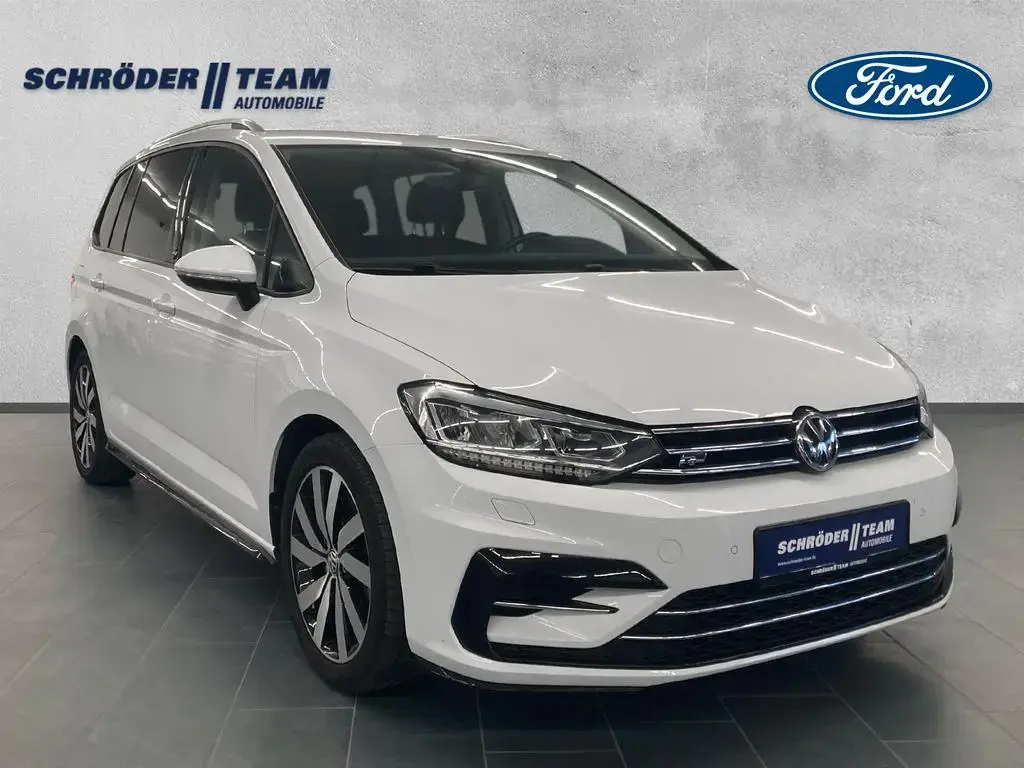 Main__Slider__Photo:Volkswagen Touran R-Line Sound BMT/Start-Stopp 06/2018-1
