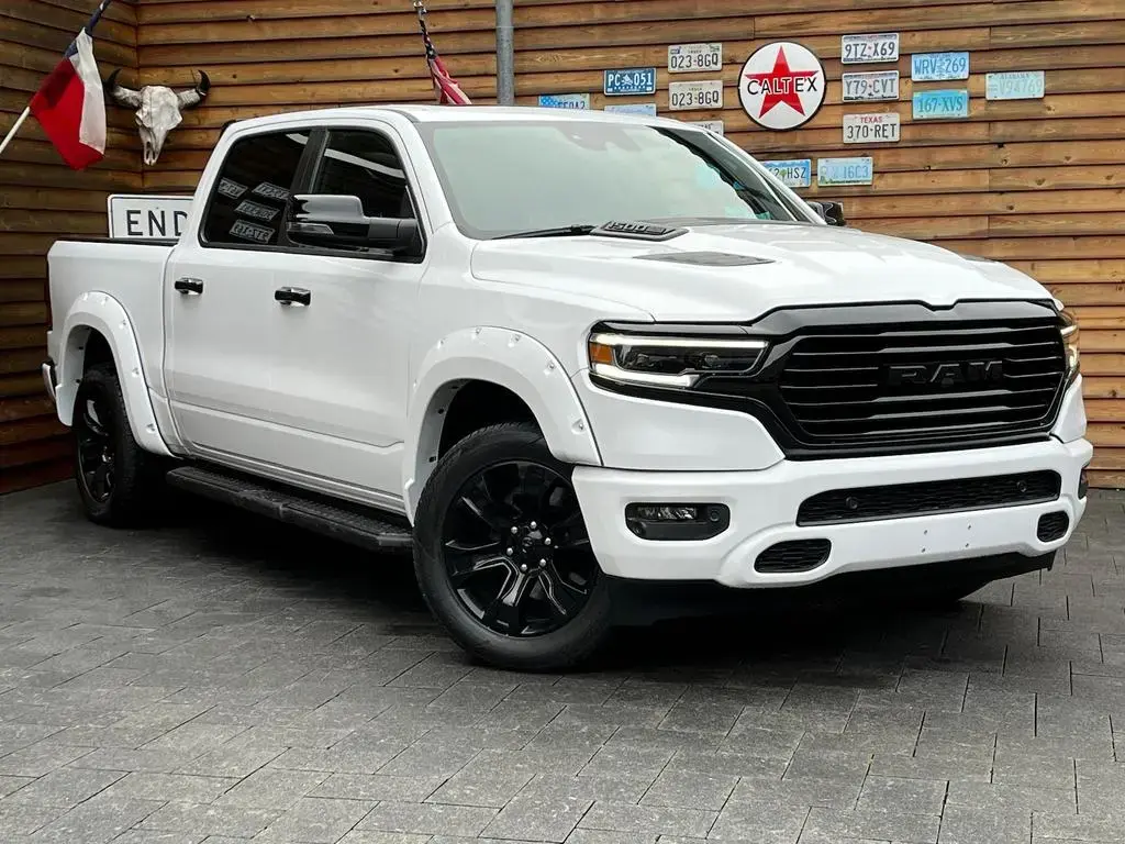 Main__Slider__Photo:Dodge RAM 1500 Laramie Night 5.7L 12´´ Navi 4x4 LPG 03/2023-1