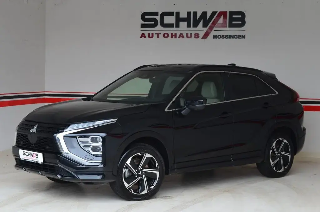 Main__Slider__Photo:Mitsubishi Eclipse Cross Top Hybrid 4WD |Navi |AHK |Glasda. 03/2022-1