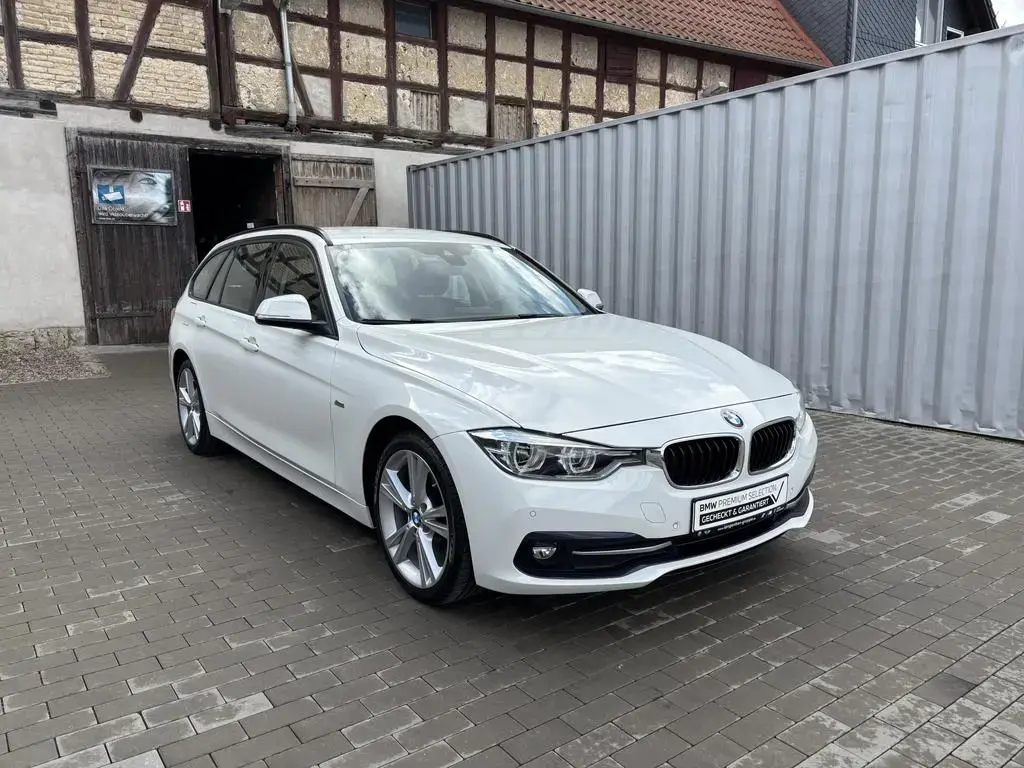 Main__Slider__Photo:BMW 3 Series 318d Touring Sport Line LED Navi SHZ PDC Tempo 03/2018-1