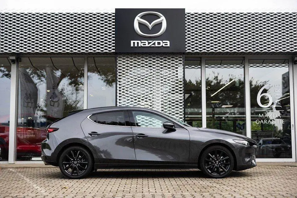 Main__Slider__Photo:Mazda 3 X 2.0i 186PS A/T AWD EXCLUSIVE COMB DASO DESI 01/2024-1