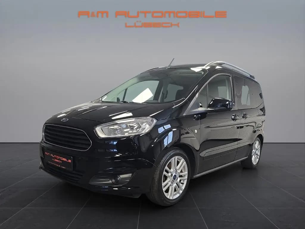 Main__Slider__Photo:Ford Tourneo Courier Titanium Zahnriemen Service TÜV 08/2018-0