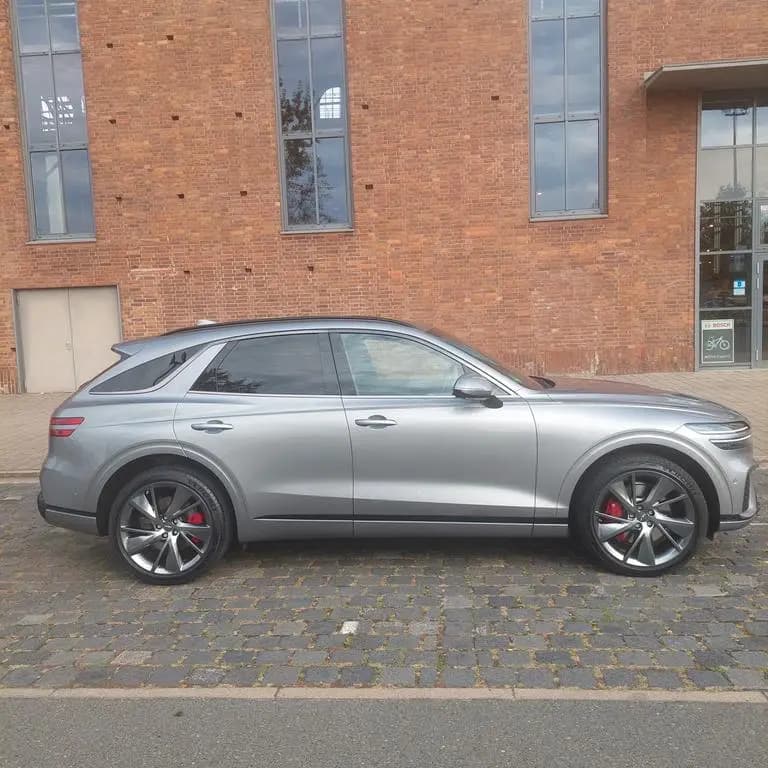 Main__Slider__Photo:Genesis GV70 Benziner 2.5T 8AT AWD Sport Sport 05/2023-0