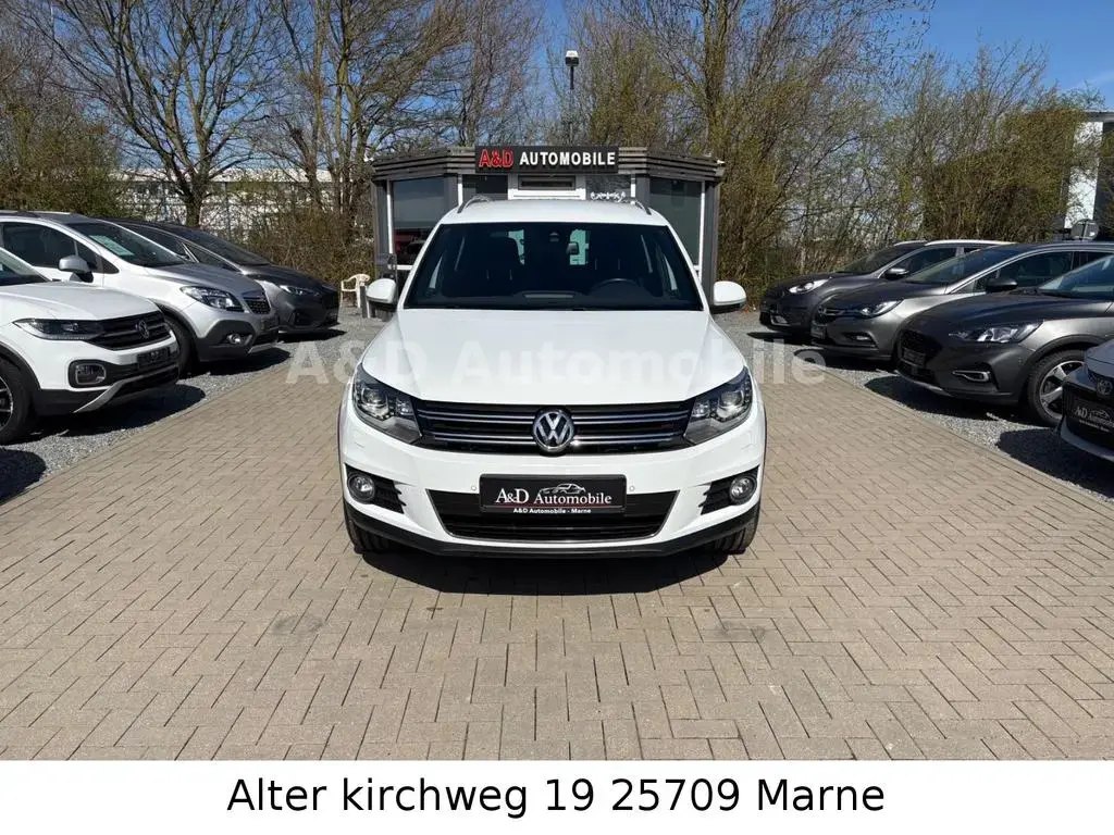 Main__Slider__Photo:Volkswagen Tiguan Lounge Sport & Style BMT 4Motion TÜV NEU 06/2015-1