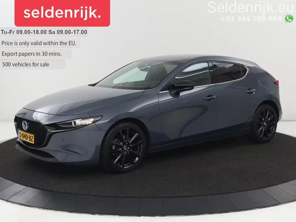 Main__Slider__Photo:Mazda 3 2.0 e-SkyActiv-G M Hybrid 150 Homura | sitzhei 01/2023-0