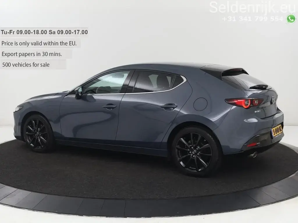 Main__Slider__Photo:Mazda 3 2.0 e-SkyActiv-G M Hybrid 150 Homura | sitzhei 01/2023-1