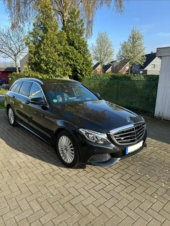 Main__Slider__Photo:Mercedes-Benz C-Class 400 4MATIC T AMG Line Autom. AMG Line 08/2017-1