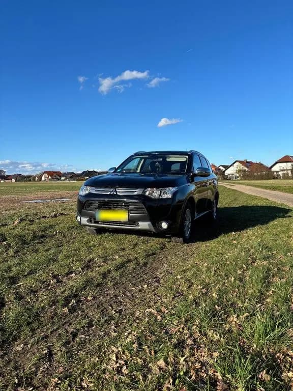 Main__Slider__Photo:Mitsubishi Outlander 4WD 7-Sitzer 2.2 DI-D... 12/2013-0