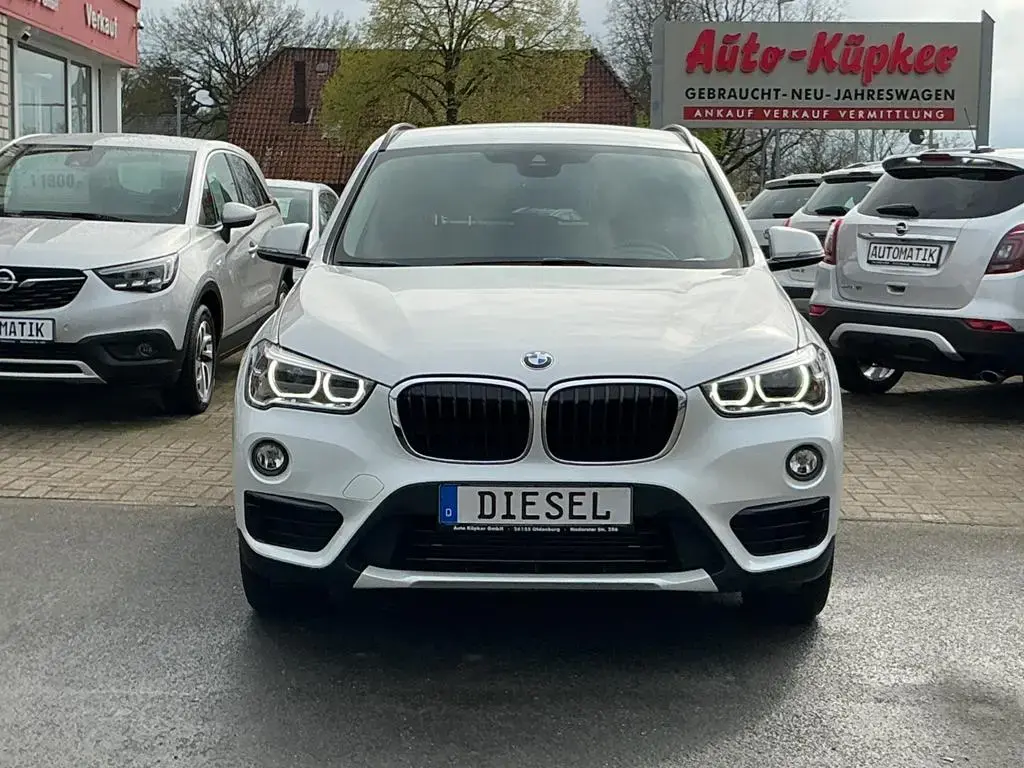 Main__Slider__Photo:BMW X1 xDrive 18 d Sport Line AHK PDC SHZ NAVI BT 02/2018-1