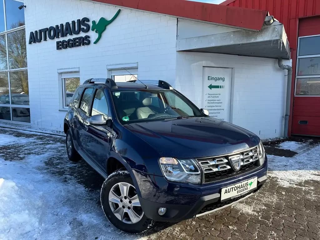 Main__Slider__Photo:Dacia Duster I Prestige 4x2/SHZ/LEDER/TEMP/GJR/LMF/PDC 06/2014-0
