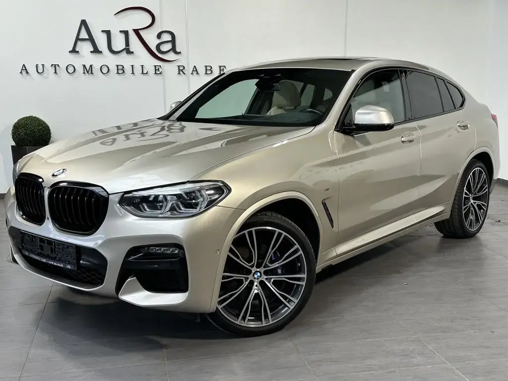 Main__Slider__Photo:BMW X4 M40d NAV+LED+HEAD-UP+PANO+360°+H&K+STANDHEIZU 05/2021-1