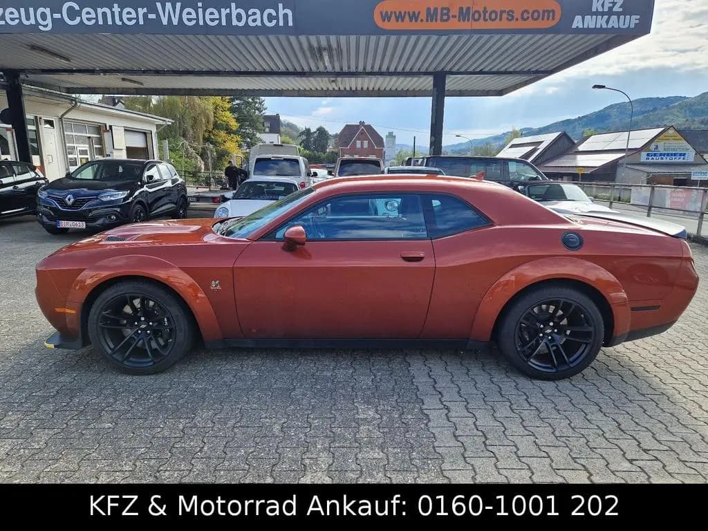 Main__Slider__Photo:Dodge Challenger Wide Body Scat Pack Final Call 1.Hand 01/2025-0