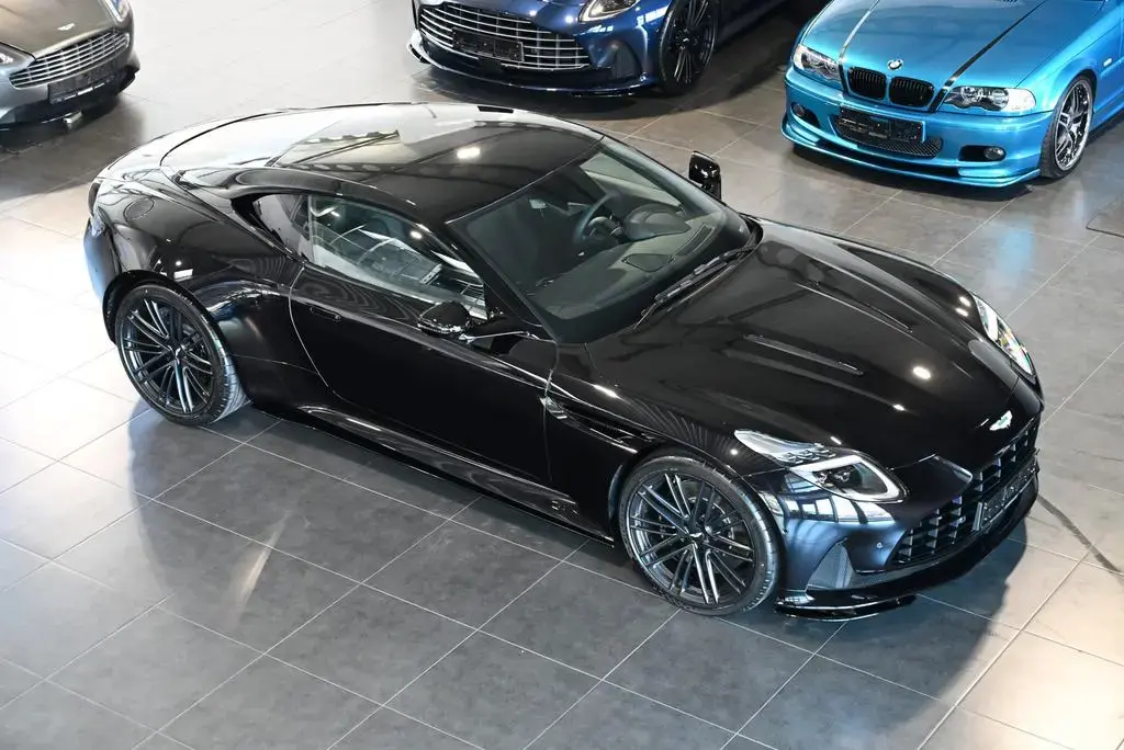 Main__Slider__Photo:Aston Martin DB12 Coupe/Onyx Black/Sport Monotone/Dark Chrome 04/2026-1