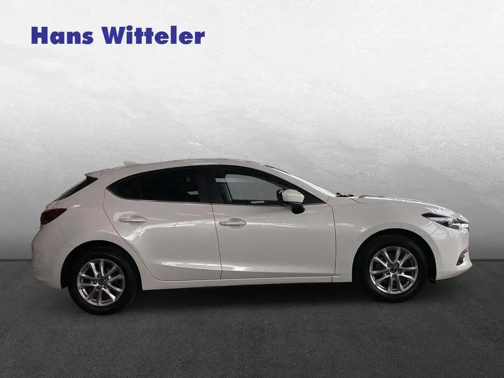 Main__Slider__Photo:Mazda 3 Exclusive-Line/8-Fach/Winterpaket/Rückfahrkame 12/2018-1