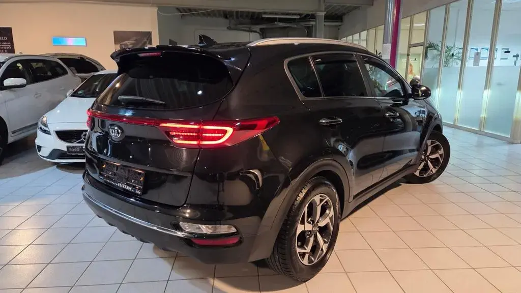 Main__Slider__Photo:Kia Sportage Dream Team-AHK+LEDER+LED+KAM+NAV+KLIMAU 08/2019-1