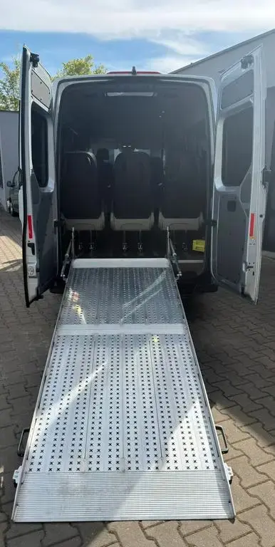 Main__Slider__Photo:MAN TGE Elektro Navi*PDC*Kam*Rollstuhlrampe 9-Sitzer 04/2021-1