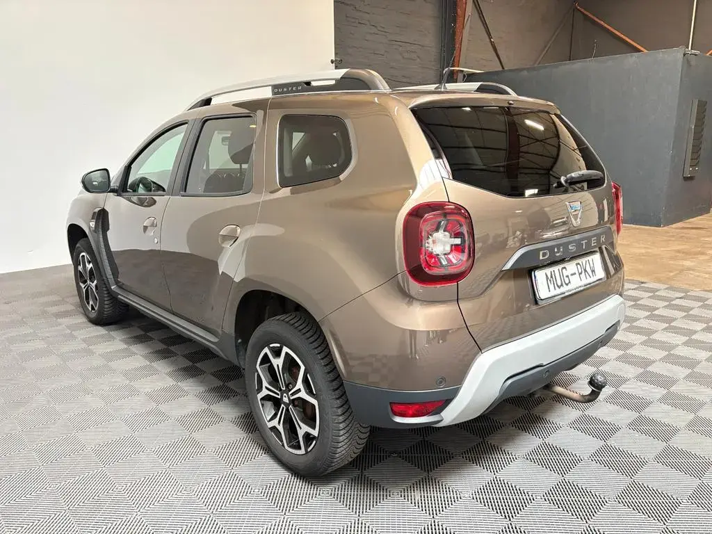 Main__Slider__Photo:Dacia Duster II Prestige 1.5dCi*AHK-Kamera-Navi-Shz* 04/2021-1