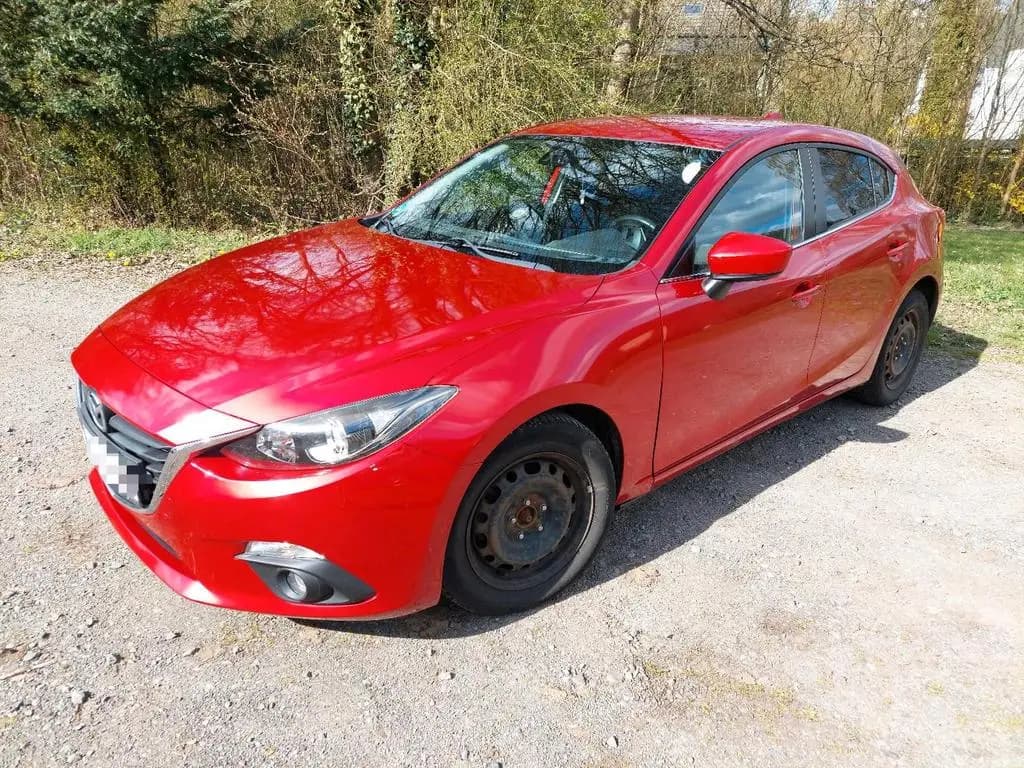 Main__Slider__Photo:Mazda 3 Limosine Center-line 02/2014-0