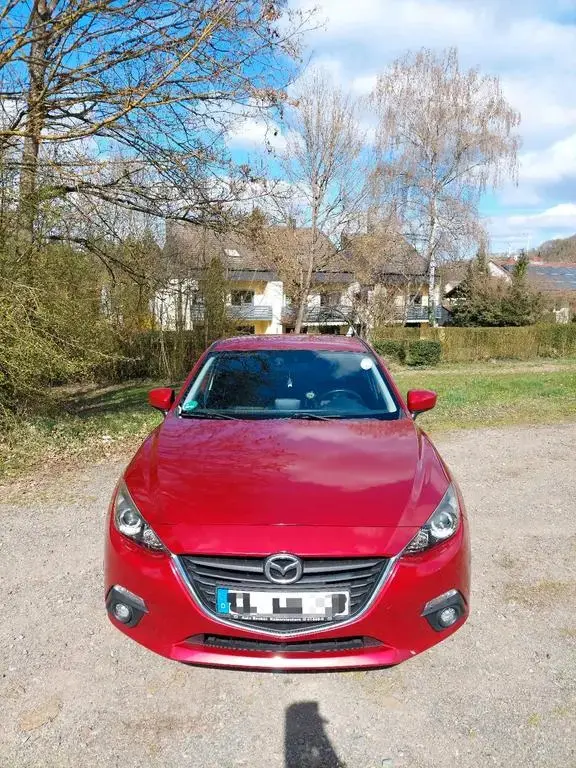 Main__Slider__Photo:Mazda 3 Limosine Center-line 02/2014-1