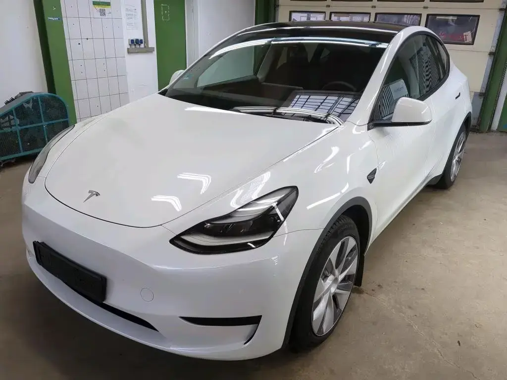 Main__Slider__Photo:Tesla Model Y RWD | 8-Fach 12/2023-1
