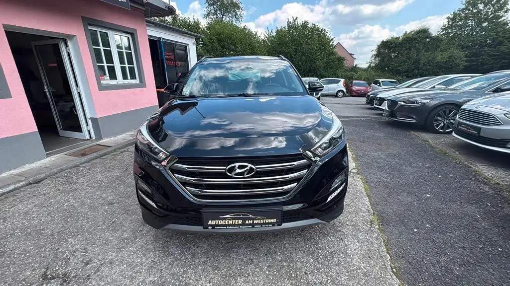 Main__Slider__Photo:Hyundai TUCSON 4WD /Pano/Leder/1.Hand/elektr. Sitze 01/2017-1