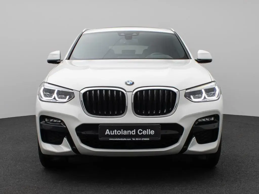 Main__Slider__Photo:BMW X4 xD30d M Sport Kamera Panoram HUD DAB HiFi AHK 08/2021-1