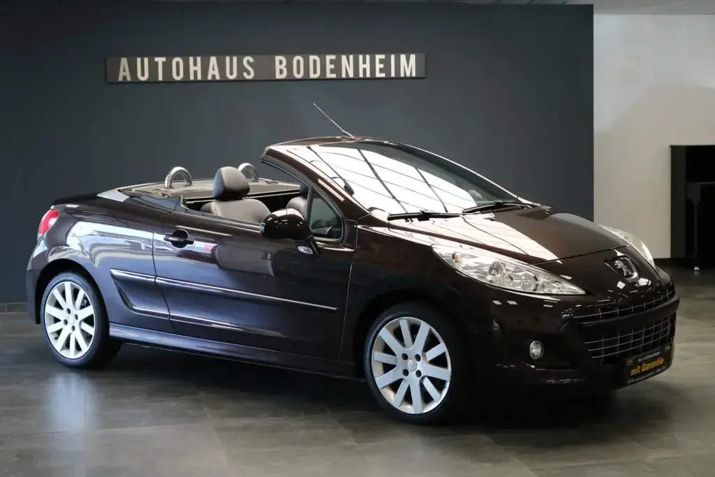 Main__Slider__Photo:Peugeot 207 CC Cabrio-Coupe Allure/PDC/LEDER/NAVI/JBL 05/2012-1