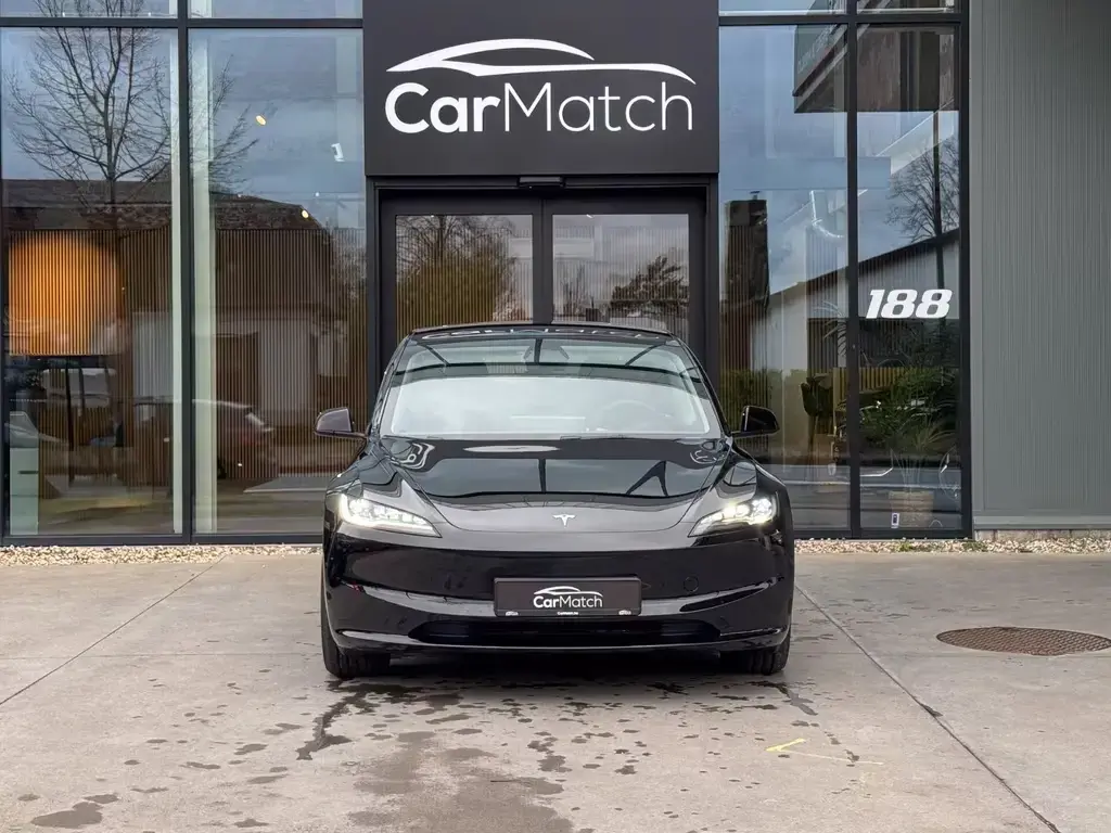 Main__Slider__Photo:Tesla Model 3 Standard Range Premium - Highland 05/2025-1