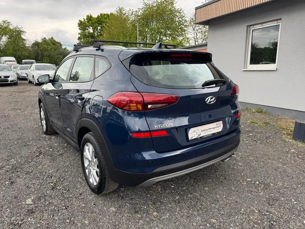 Main__Slider__Photo:Hyundai TUCSON Premium 4WD 1-Hand Scheckheft Kamera 05/2019-1