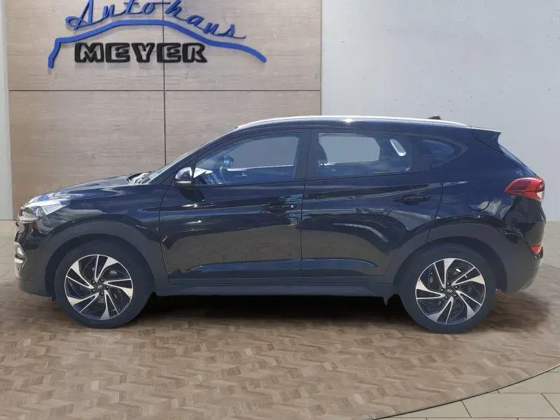 Main__Slider__Photo:Hyundai TUCSON 1.6 Trend Navi/Sitzh./DAB/Temp./8 fach Al 05/2017-1