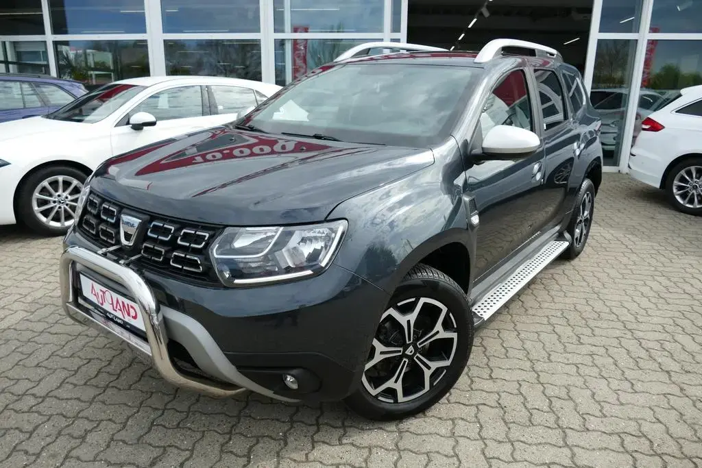 Main__Slider__Photo:Dacia Duster II 1.3 TCe 130 Prestige Navi Kamera AHK A 08/2019-1