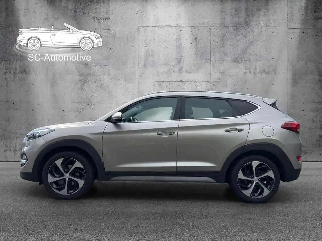 Main__Slider__Photo:Hyundai TUCSON Premium 4WD*AHK*2-Zonen-Klima*Scheckheft 02/2018-1