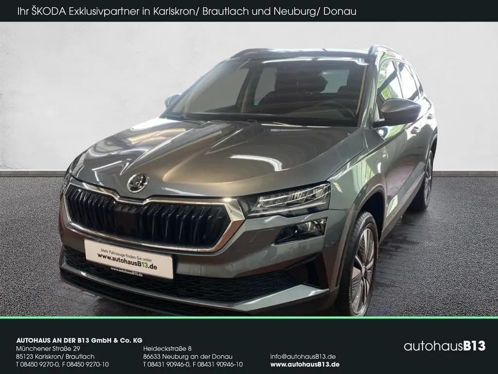Main__Slider__Photo:Skoda Karoq Tour 1.5 TSI NAVI+PDC+KAMERA+GRA+LED+BT 03/2024-0