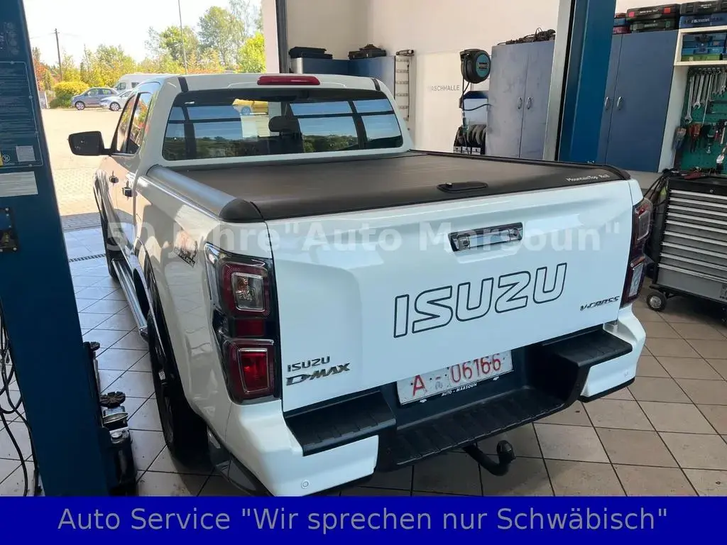 Main__Slider__Photo:Isuzu D-Max DouplCab 4WD V-CROSS 8x ALU Gar.8/29Wie Neu! 08/2024-1