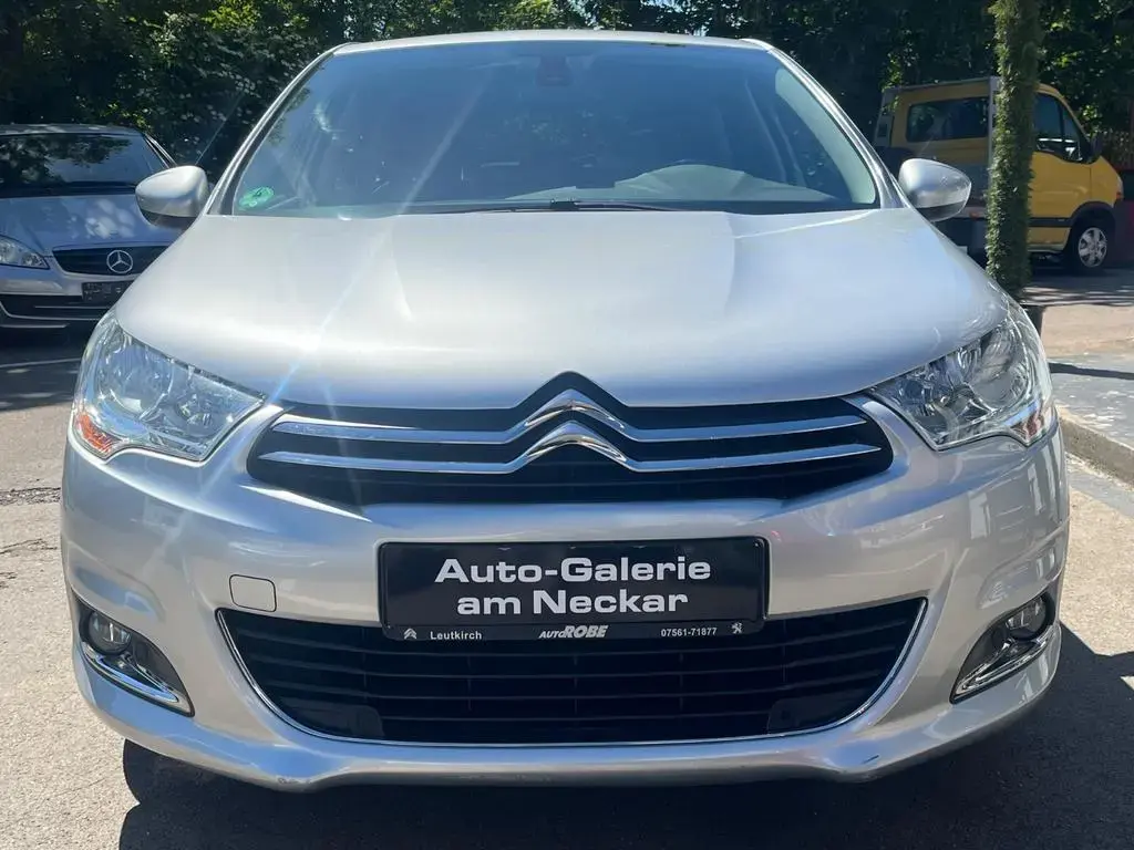 Main__Slider__Photo:Citroën C4 Lim. Exclusive 1.6 Klimaauto NAVI PDC Tempo 07/2014-1