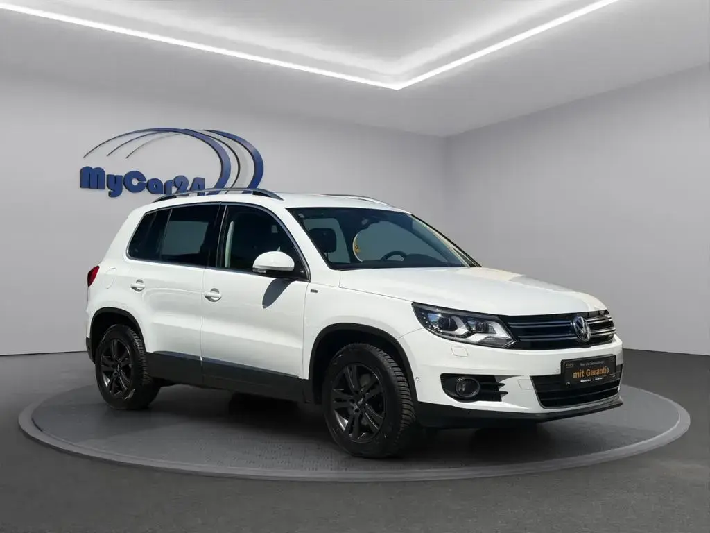 Main__Slider__Photo:Volkswagen Tiguan I Autom. I CarPlay I AHK I SZH I 4Season 04/2014-1