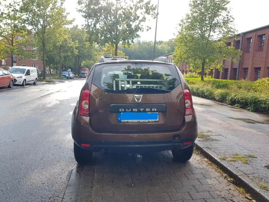 Main__Slider__Photo:Dacia Duster 1.6 16V 105 4x2 Destination Destination 05/2013-1