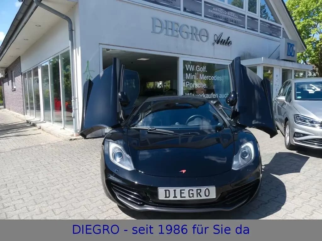 Main__Slider__Photo:McLaren MP4-12C * Modelljahr 2013 * 1. Hand 03/2012-0
