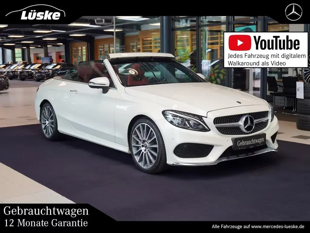 Main__Slider__Photo:Mercedes-Benz C 300 Cabrio AMG Line cranberry Carbon Burmester 04/2017-0