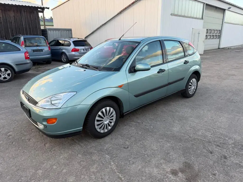 Main__Slider__Photo:Ford Focus 1.6 Ghia Autom. Tüv Neu 12/1999-1