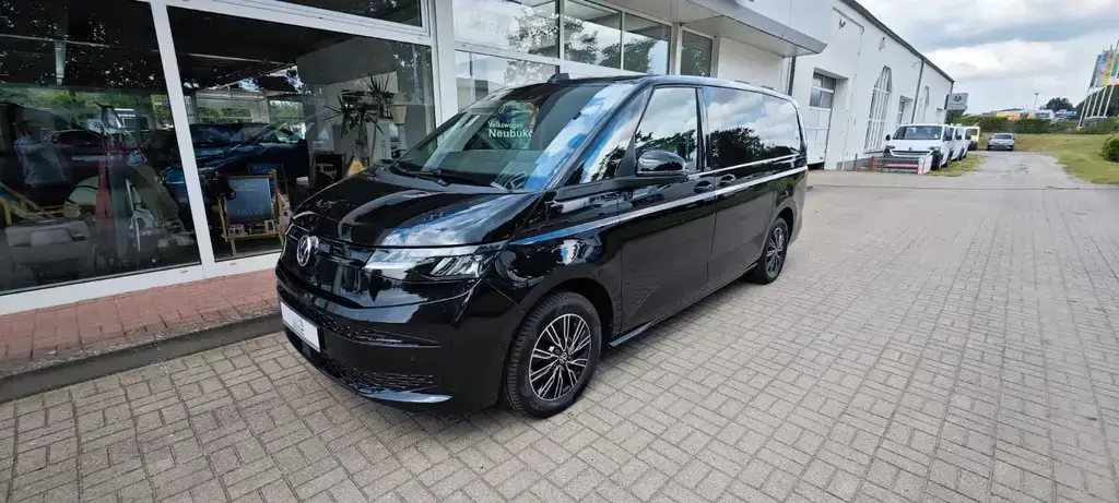 Main__Slider__Photo:Volkswagen T7 Multivan lang/LED/NAVI/AHK/Sitzheizung/ALU 03/2023-1