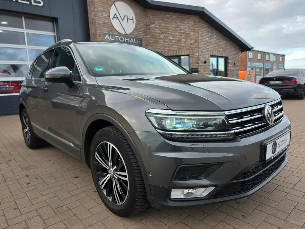 Main__Slider__Photo:Volkswagen Tiguan Sound 1.4 TÜV Neu/Scheckh./1. Hand/AHK 05/2017-1
