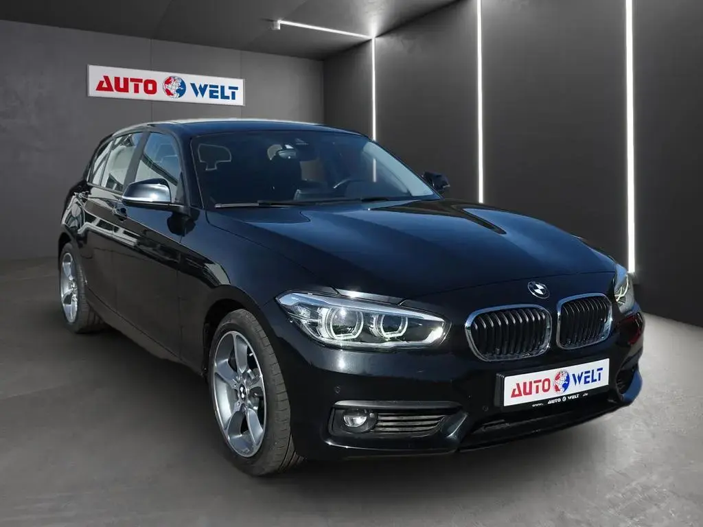 Main__Slider__Photo:BMW 118 i Automatik Advantage LED Navi Sitzheizung Te 01/2019-1