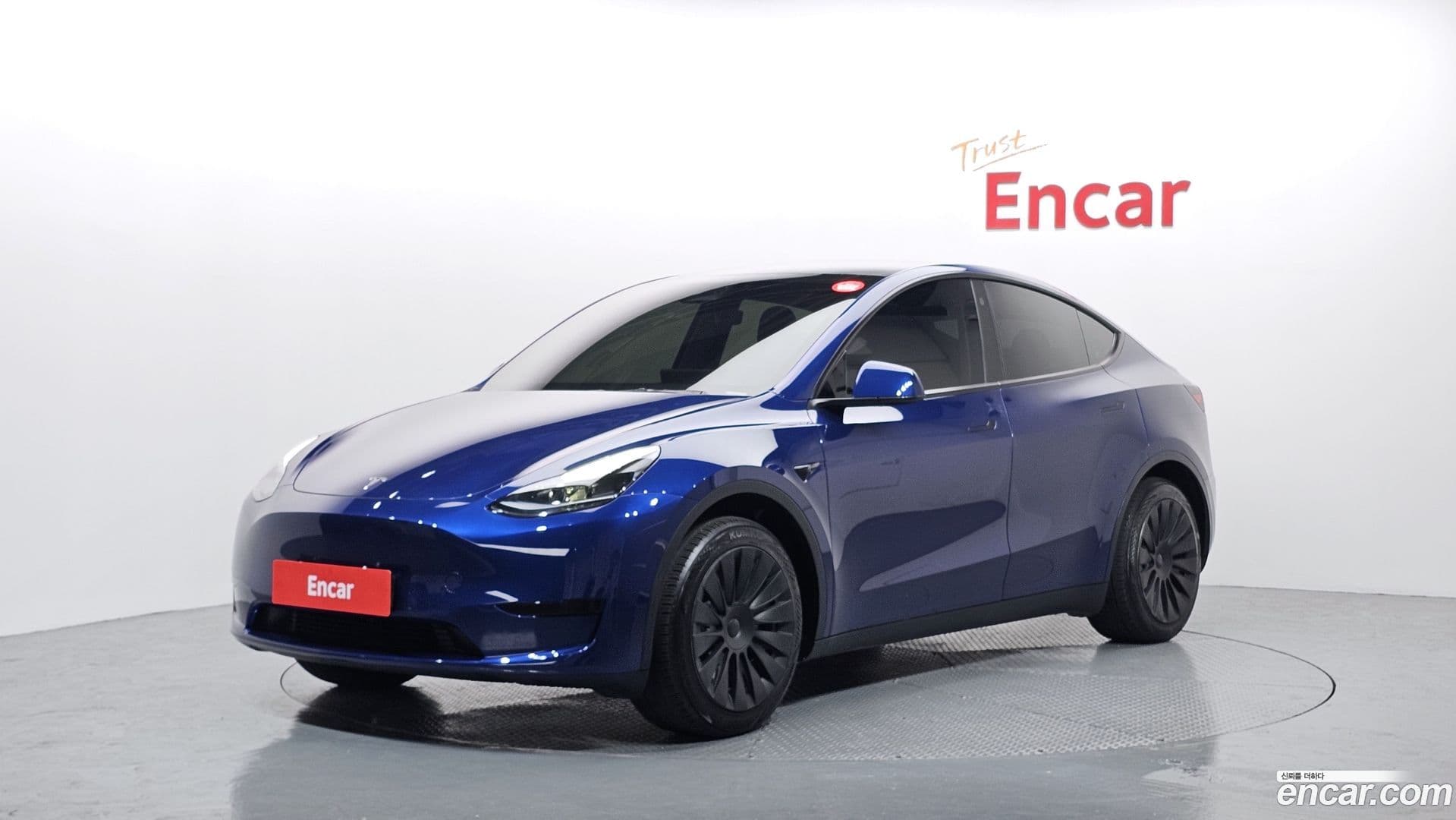 Main__Slider__Photo:Model Y Tesla 2023.10-0
