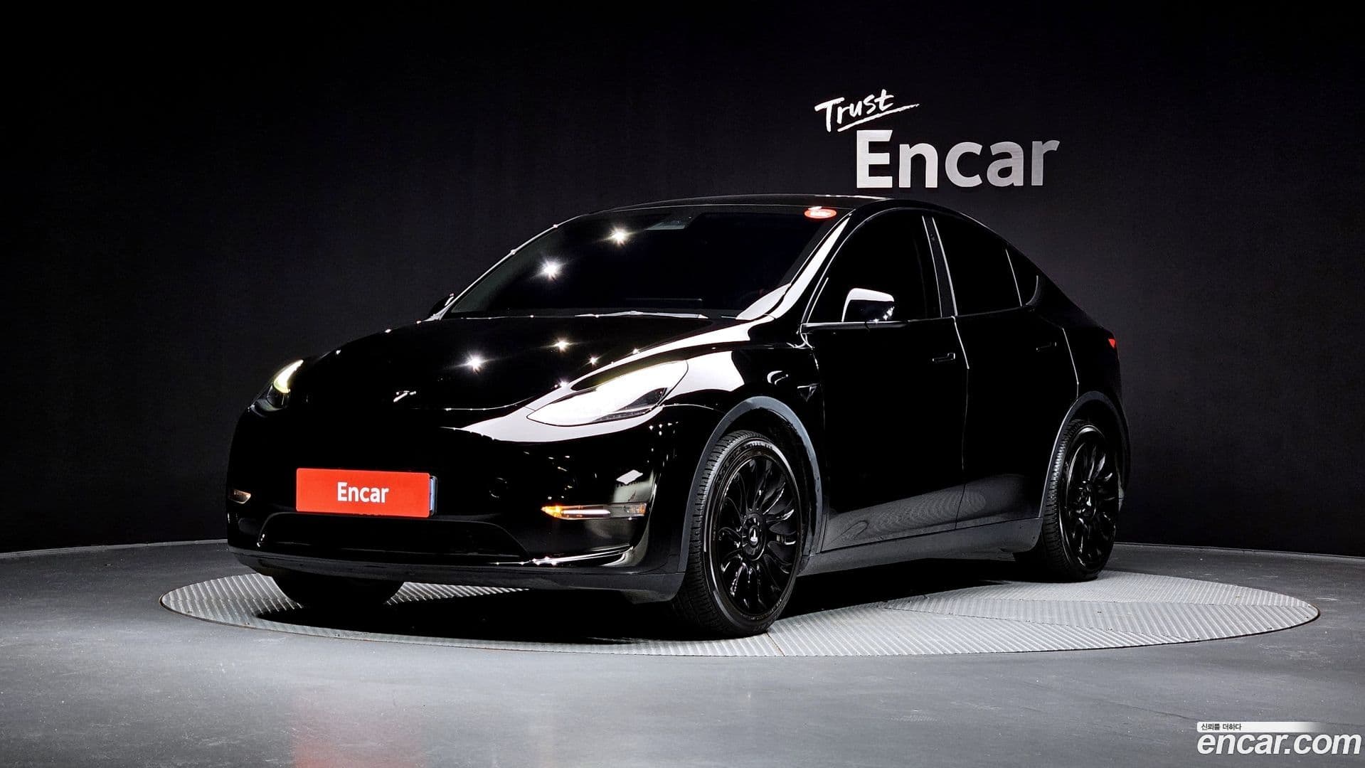 Main__Slider__Photo:Model Y Tesla 2023.4-0