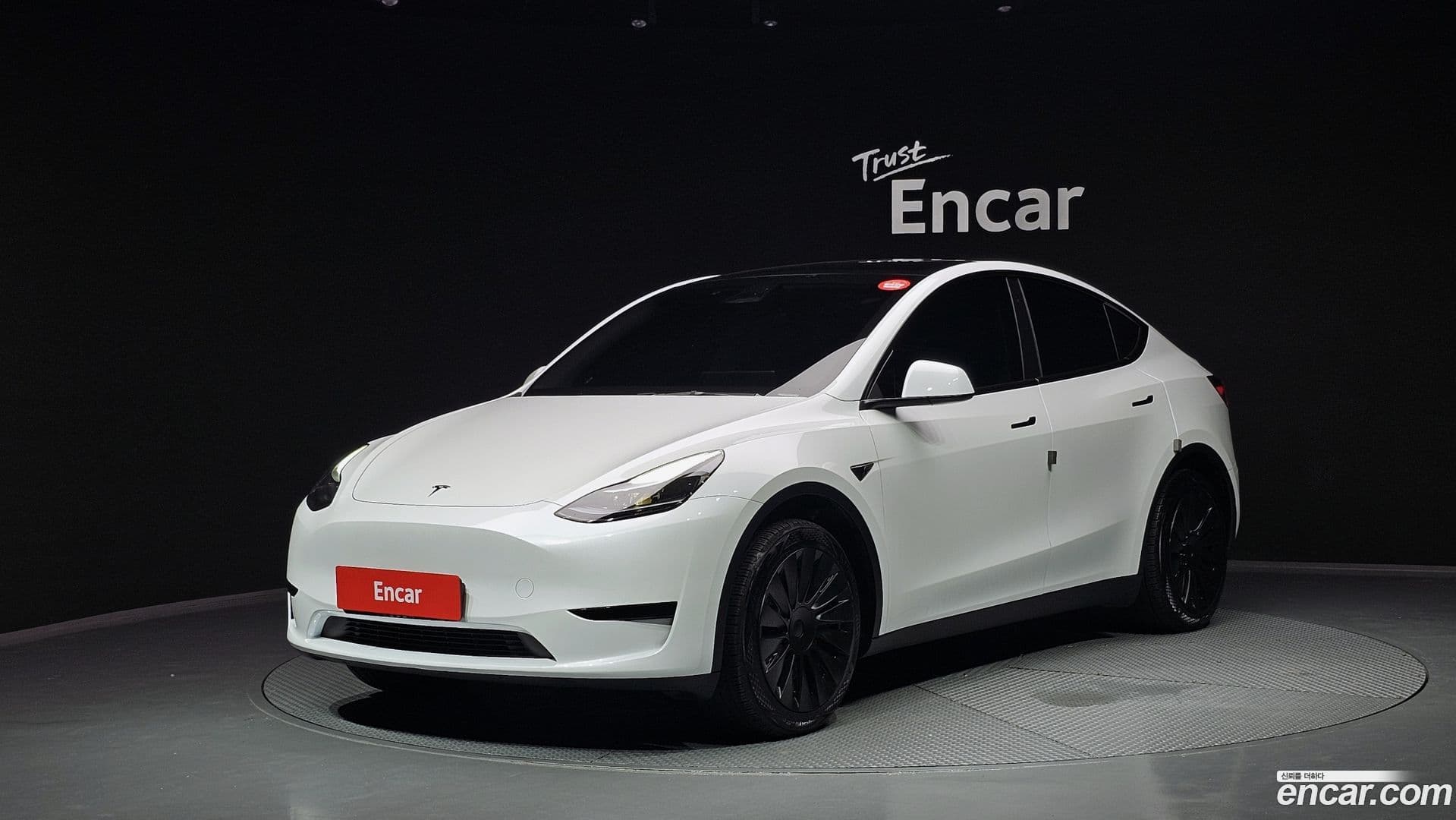 Main__Slider__Photo:Model Y Tesla 2023.10-0