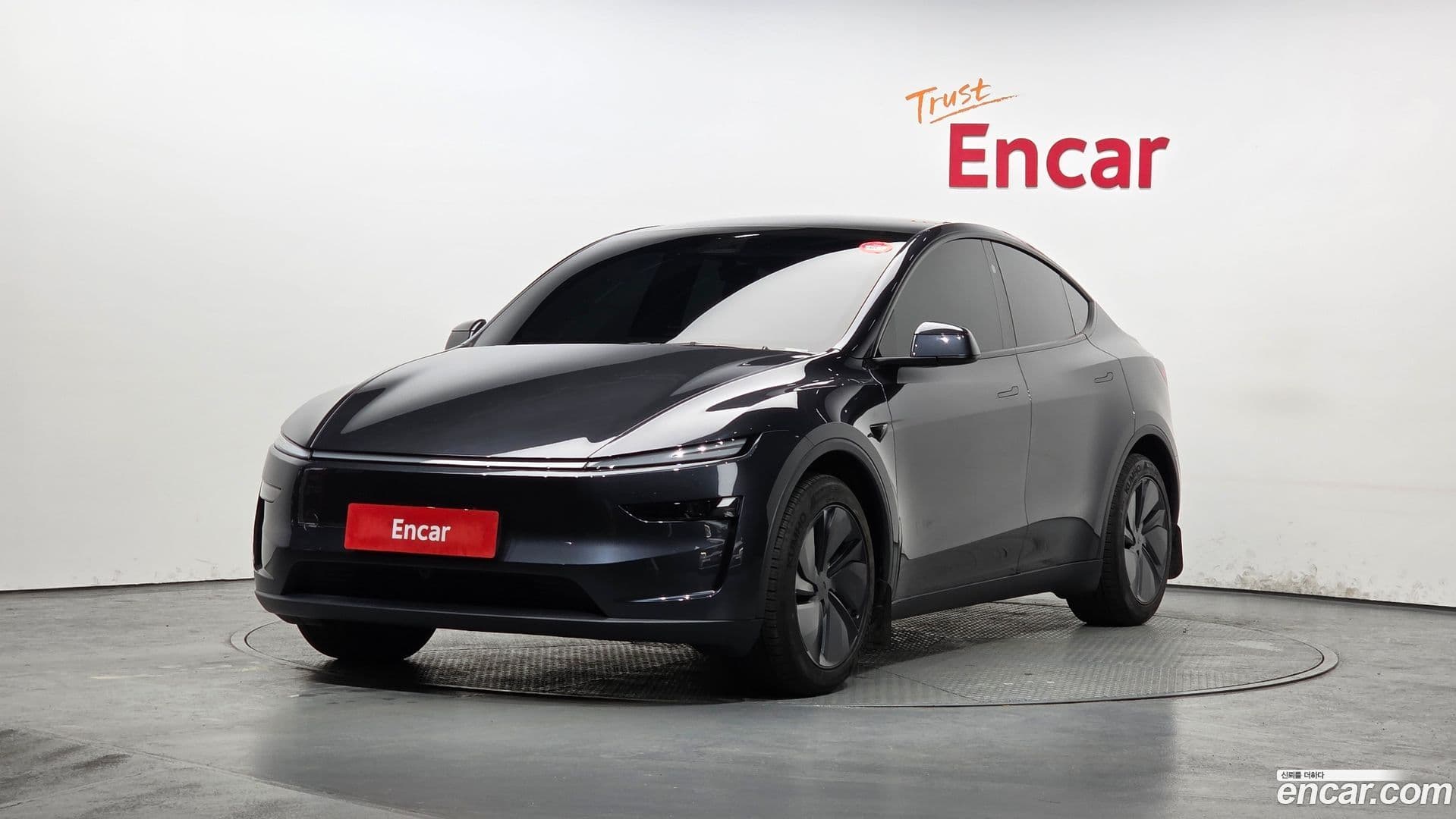 Main__Slider__Photo:Model Y Tesla 2025.6-0
