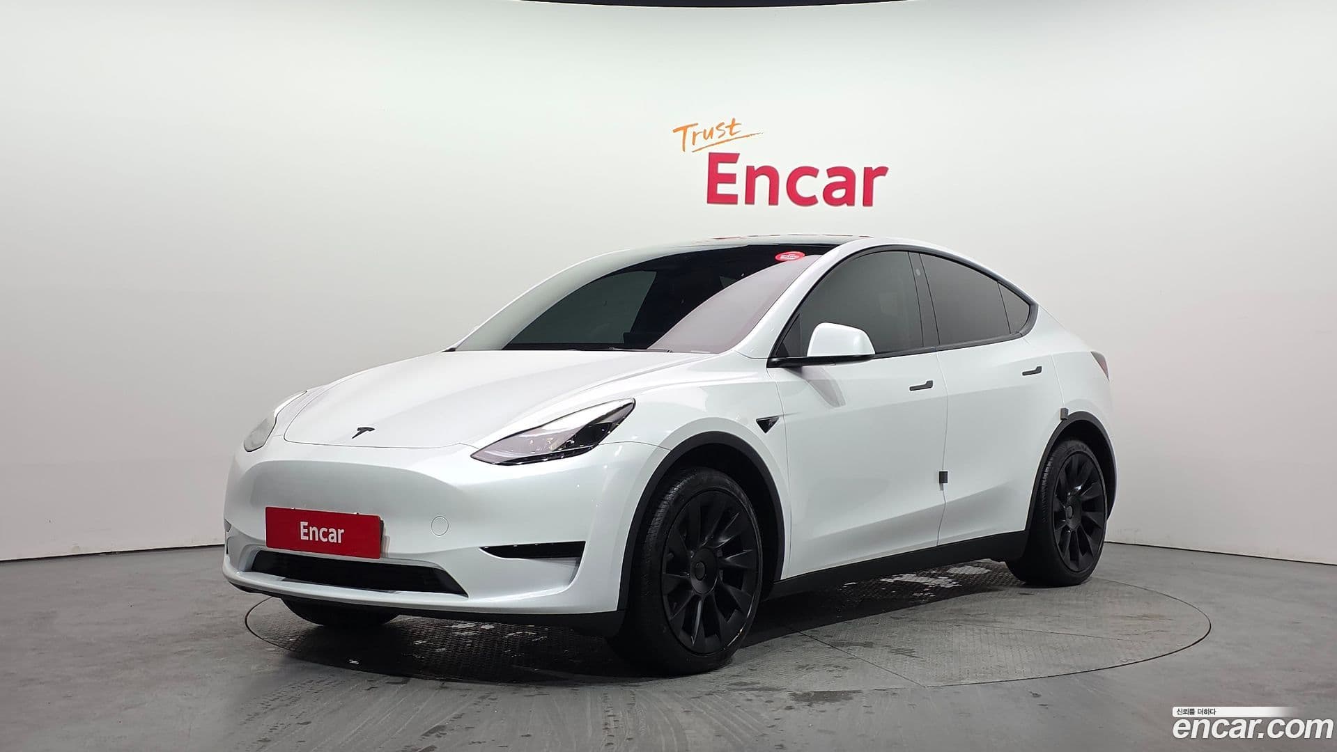 Main__Slider__Photo:Model Y Tesla 2023.7-0