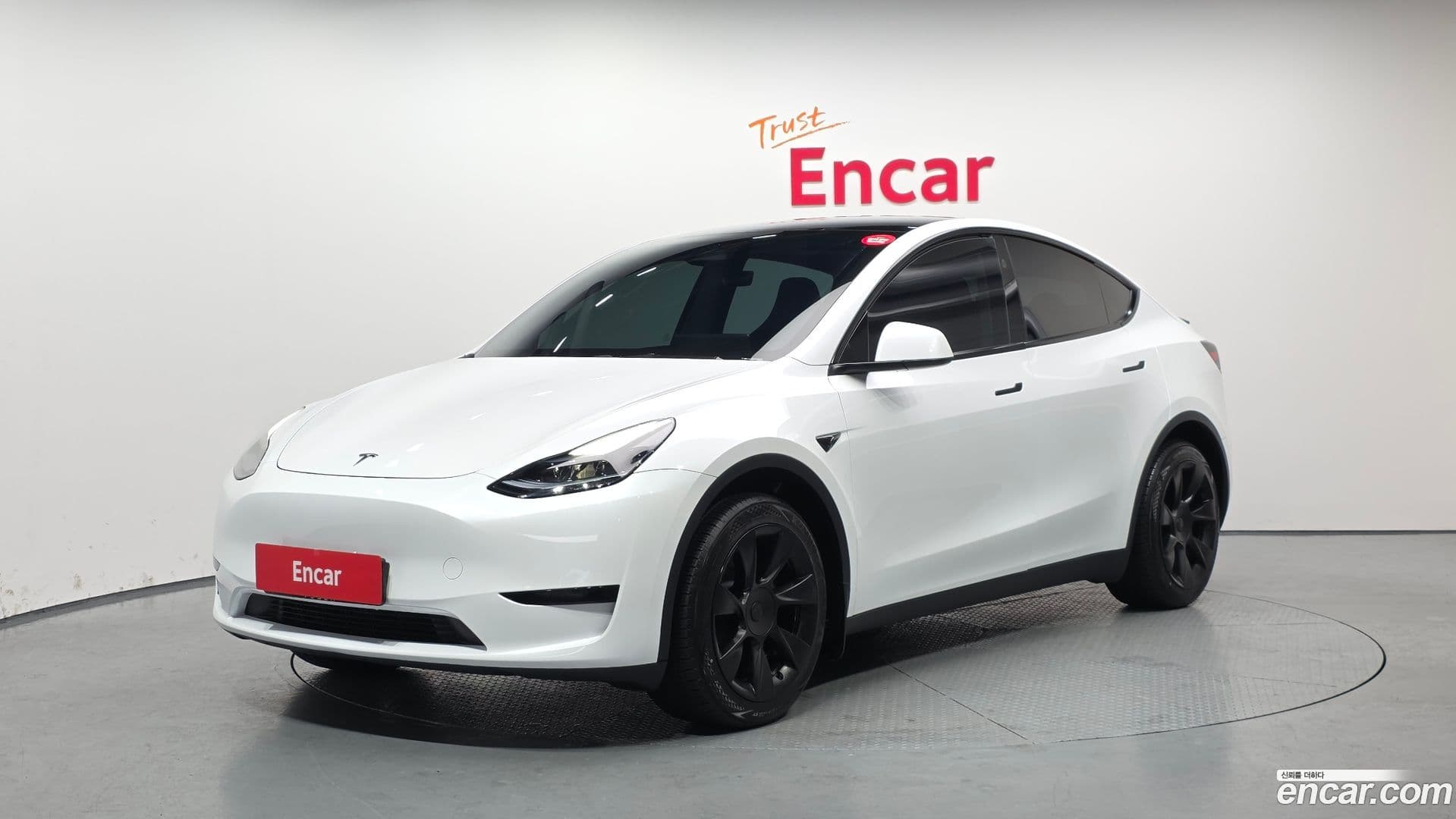 Main__Slider__Photo:Model Y Tesla 2024.5-0