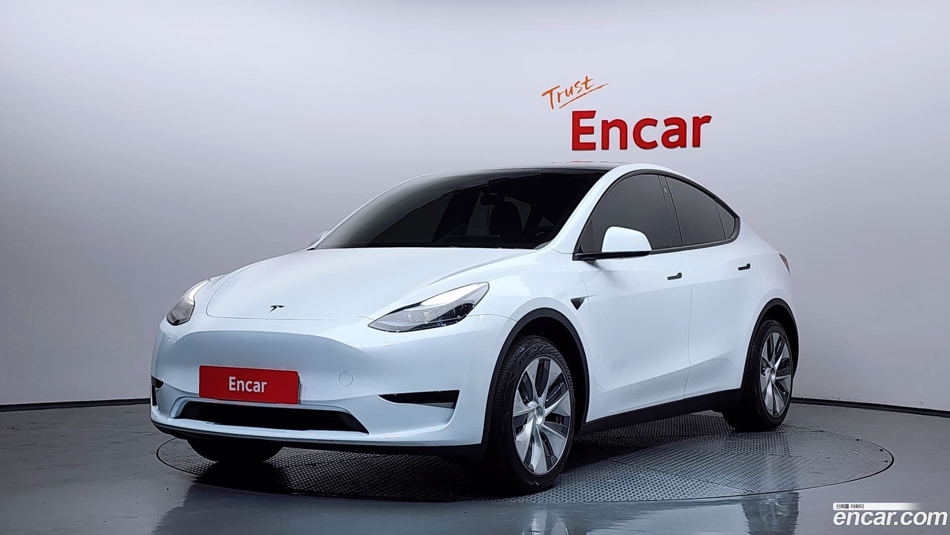 Main__Slider__Photo:Model Y Tesla 2023.7-0